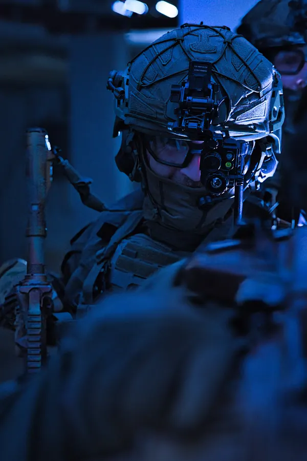Helmet and night vision device in profile, cold light from the side