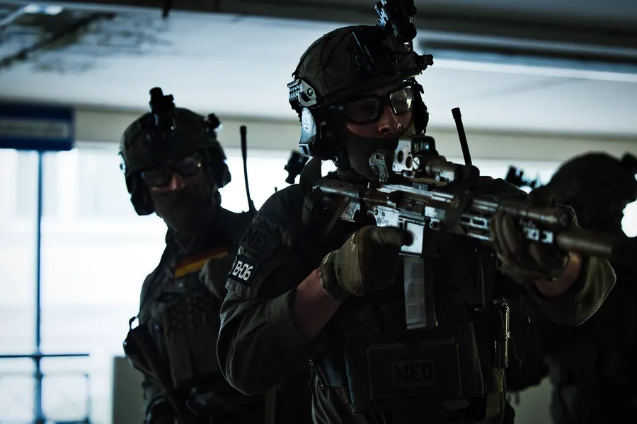 Two operators moving along a platform in an urban setting