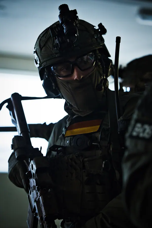Operator in low visibility kit against an urban backdrop